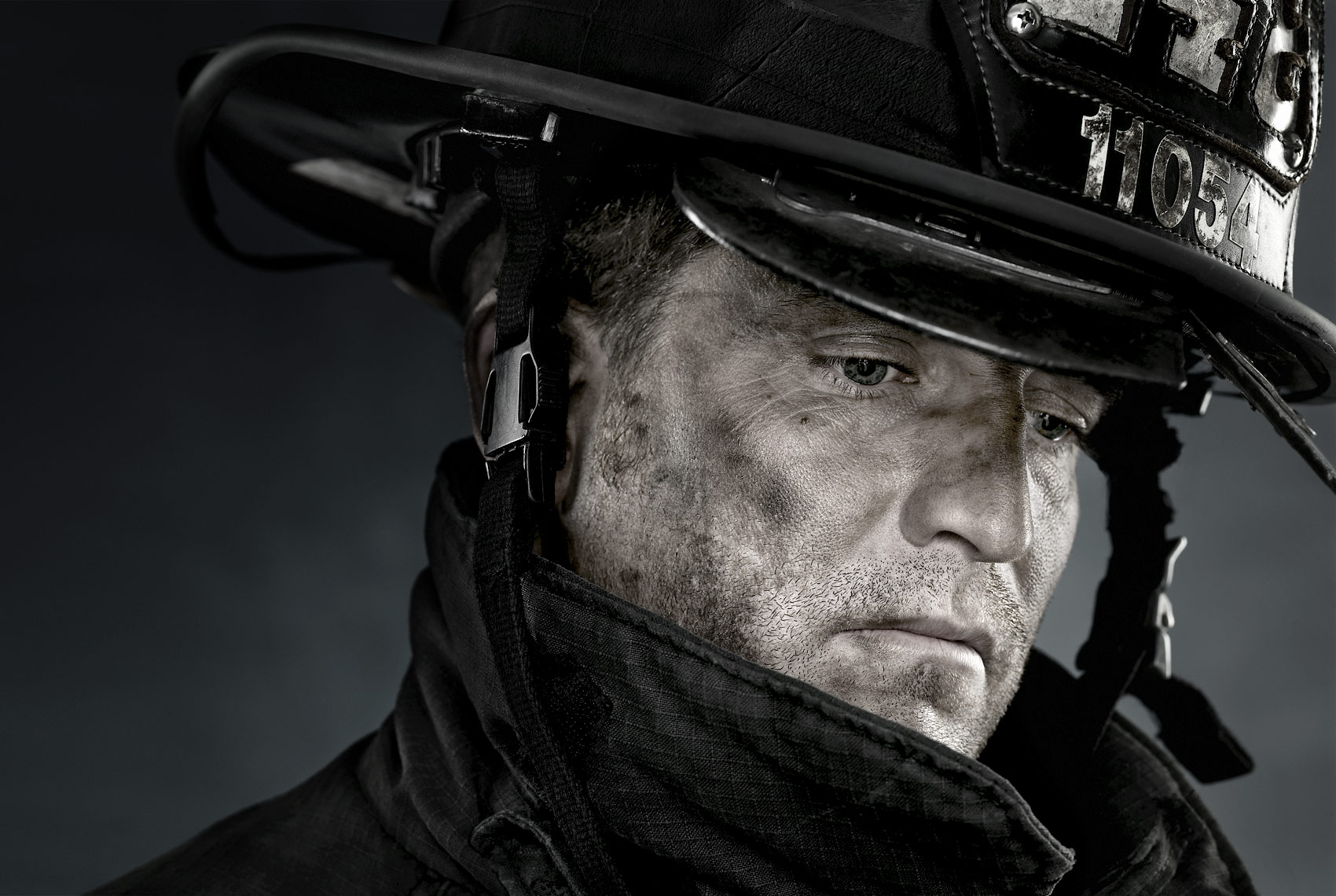 Portrait of a New York City firefighter with helmet